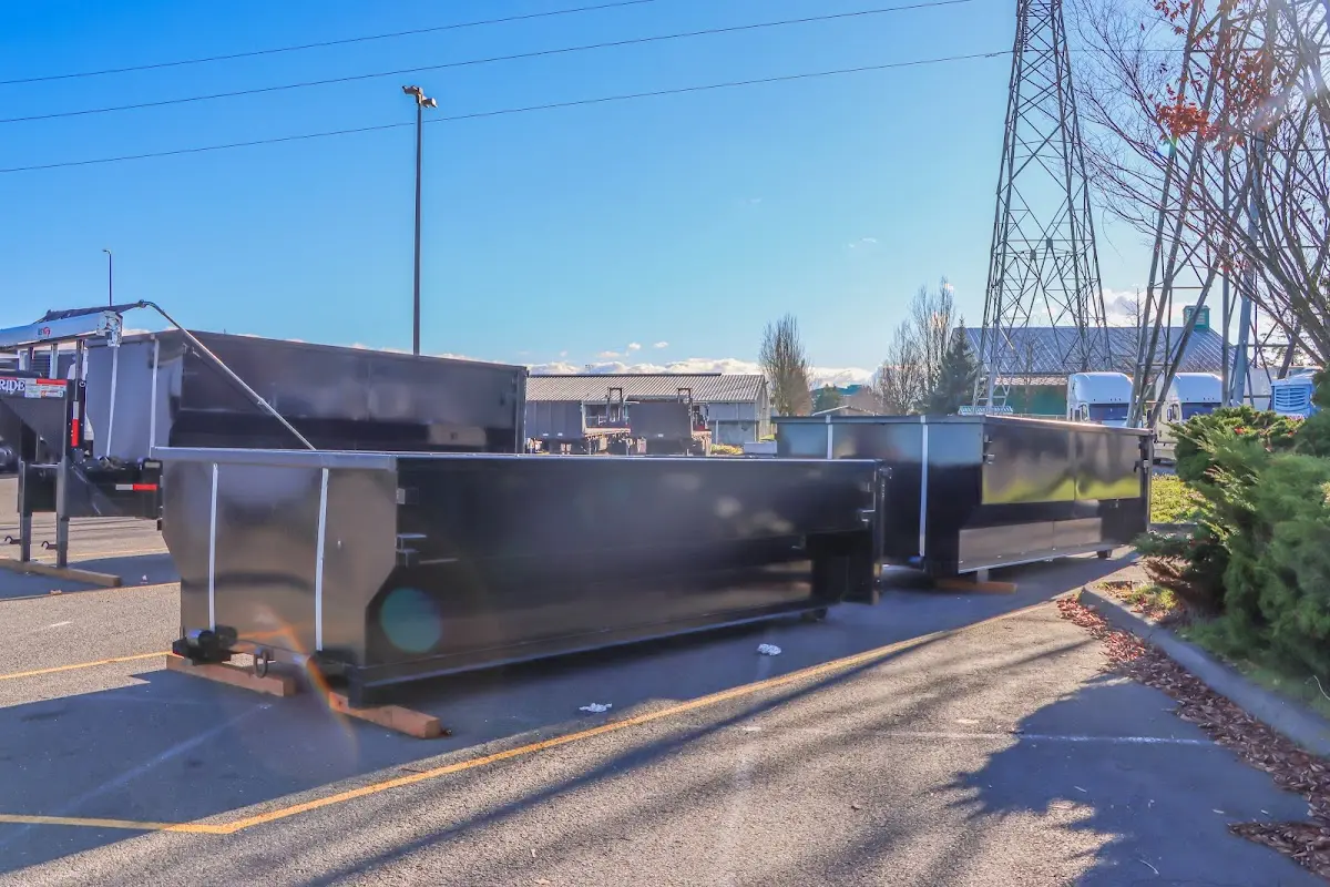 Roll-off dumpster ready for waste disposal at job site for 4 Yard Dumpster Rental in Hudsonville